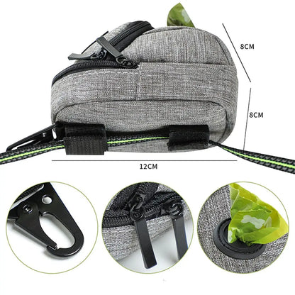 Gray dog walking pouch with waste bag dispenser, zipper pockets, and clip attachment, 12x8cm.