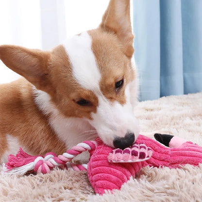 Corgi chewing pink corduroy squeaky dog toy, bite-resistant plush animal shape toy for small and large dogs