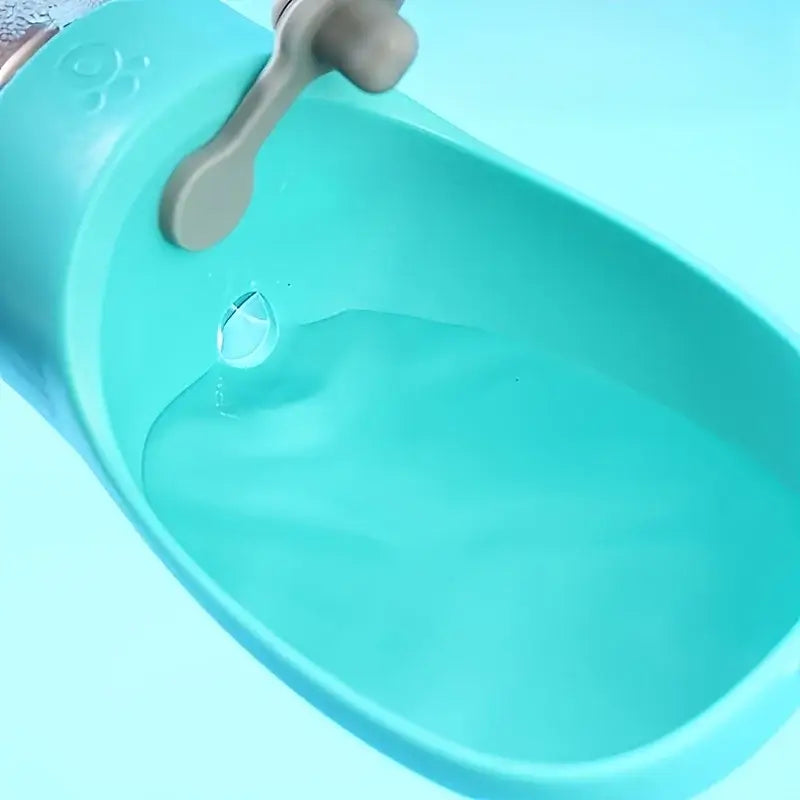 portable dog water bottle for outdoor use, turquoise pet drinking bowl with spill-resistant design