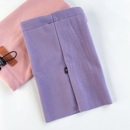 Soft fleece dog snoods in pastel pink and purple, cozy dog neck warmers on white background