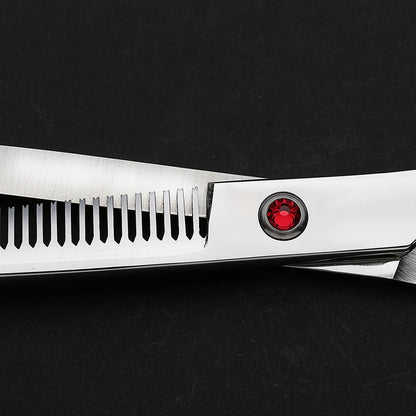 Stainless steel dog grooming thinning shears with red pivot screw on black background
