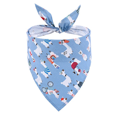 Blue dog bandana with colorful cartoon llama pattern, folded and tied, pet accessory