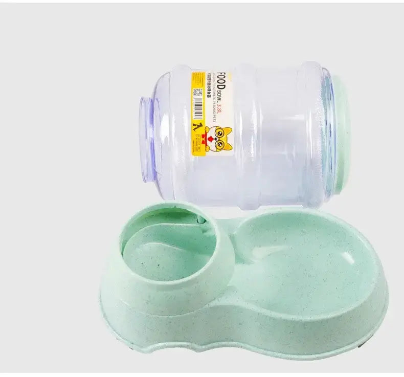 Pet water dispenser with plastic bottle and dual pet feeding bowl for dogs and cats