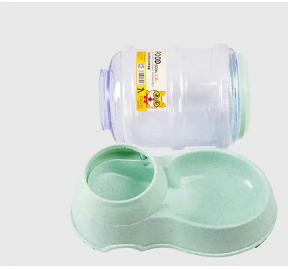 Pet water dispenser with plastic bottle and dual pet feeding bowl for dogs and cats