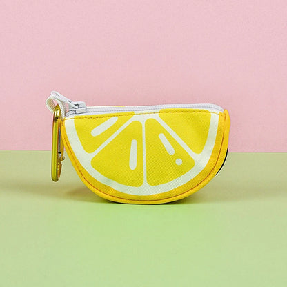 Lemon print dog poop bag holder dispenser with abstract citrus design, zipper pouch, and clip for dog leashes