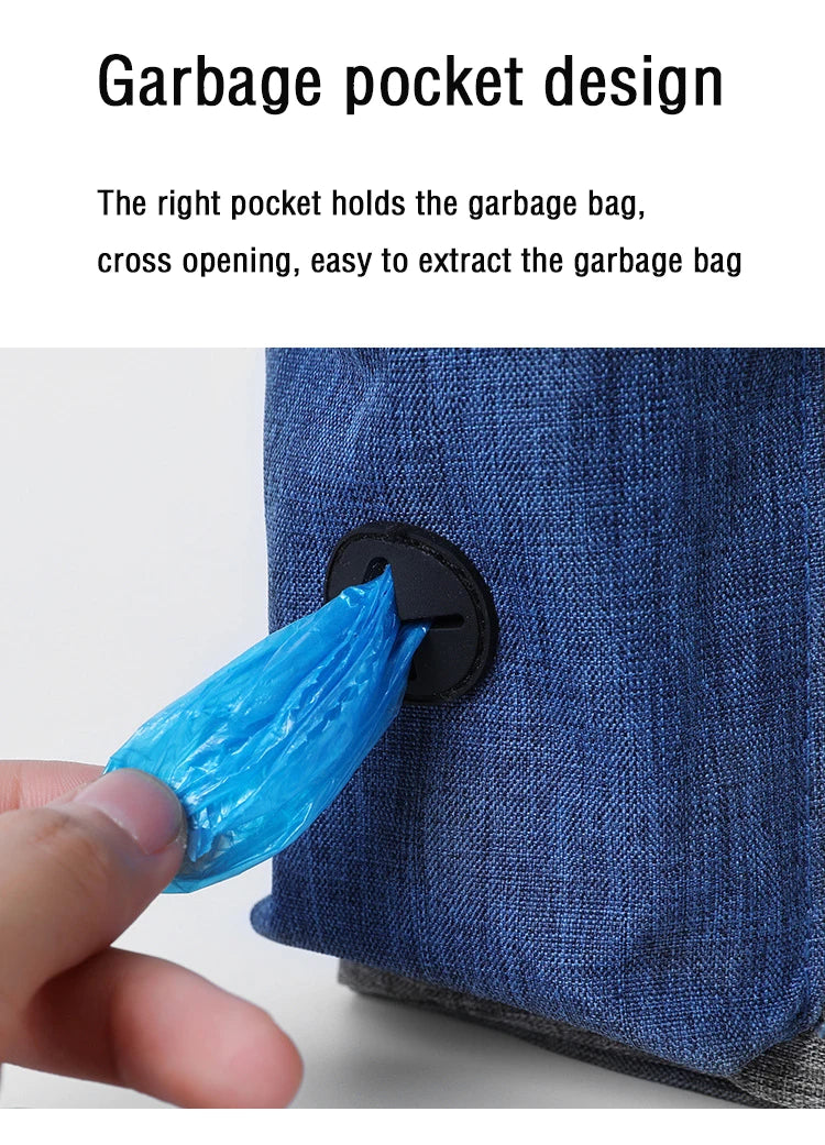 Hand pulling blue dog waste bag from dispenser pocket on blue fabric bag