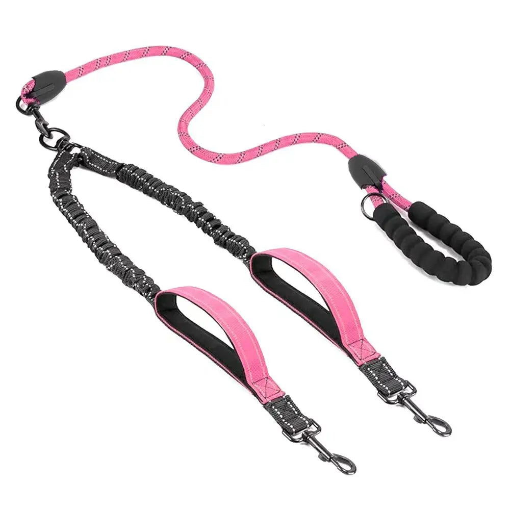 Pink dual dog leash with padded handle and reflective stitching for walking two dogs