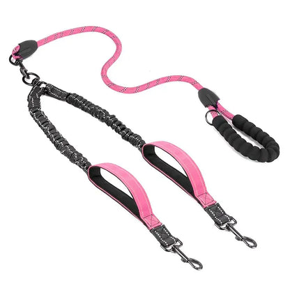 Pink dual dog leash with padded handle and reflective stitching for walking two dogs