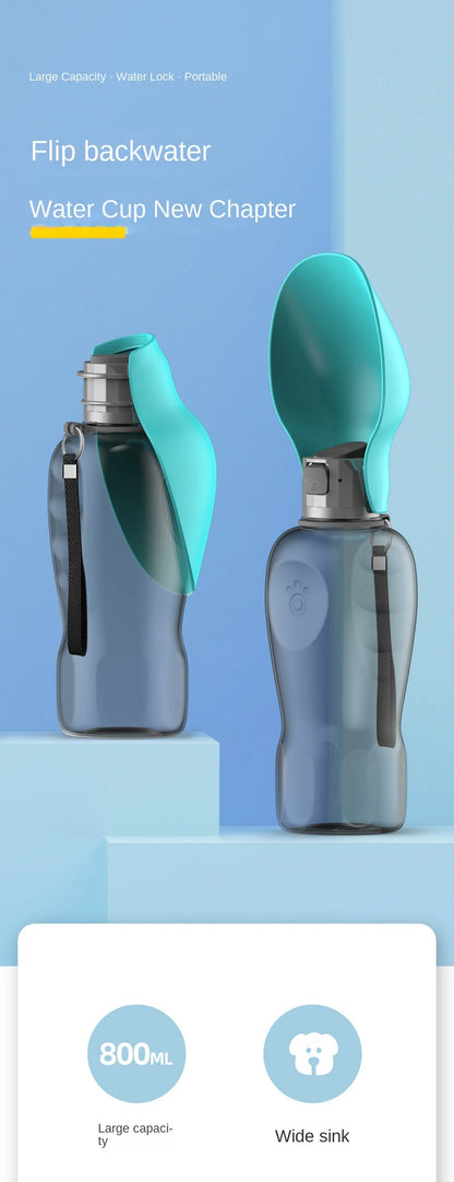 Portable dog water bottle with flip-out drinking bowl and 800ml capacity on blue background
