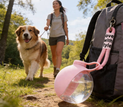 portable dog water bottle attached to backpack for outdoor walks with dog and hiker
