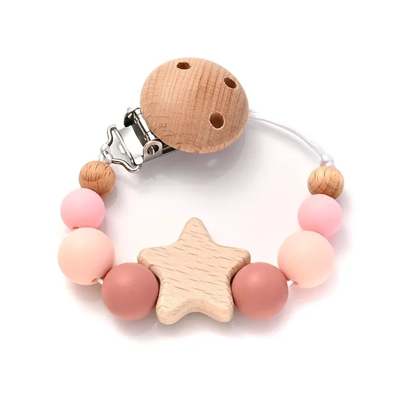 wooden pacifier clip teether with star wood beads and pink silicone round beads for baby chewing and soothing