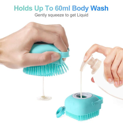 Silicone dog shampoo brush dispensing body wash, demonstrating the squeeze action to release shampoo.