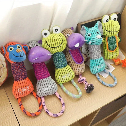 Colorful animal-shaped plush dog chew toys with rope handles on a wooden surface