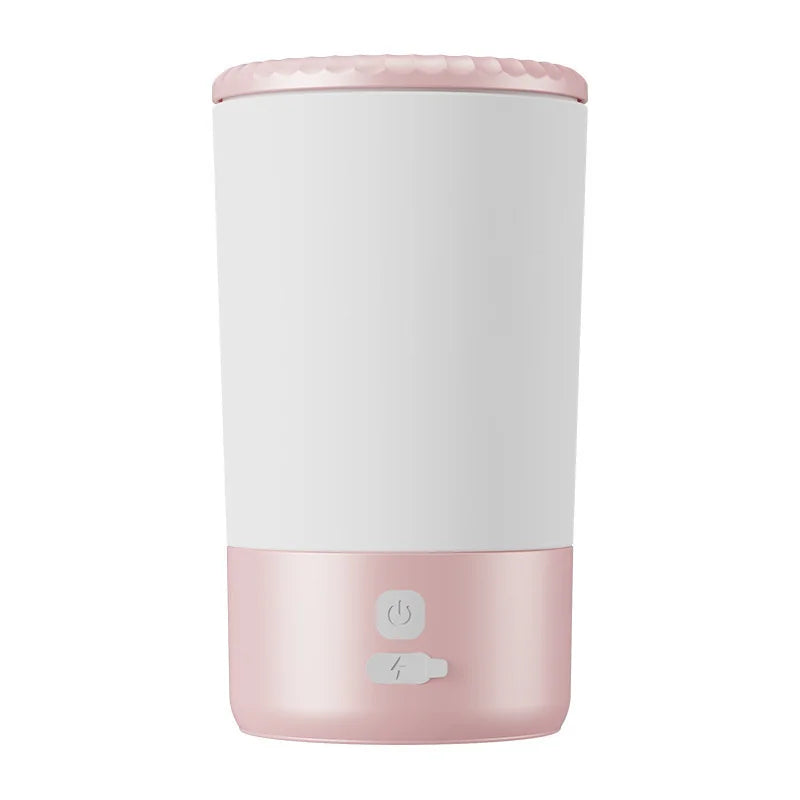 Pink automatic pet paw cleaner with soft silicone brush, USB-C rechargeable waterproof portable dog and cat paw washer