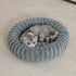 Grey plush donut cat bed with ultra soft raised bolster, cozy warm nest for small medium cats and dogs
