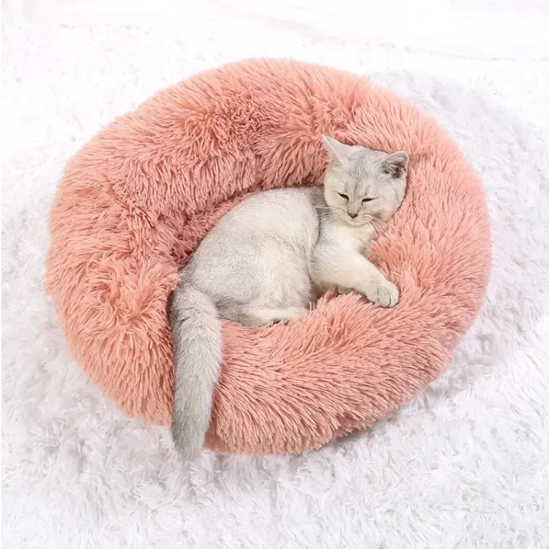 Washable plush donut cat bed for cozy winter sleep, soft calming round pet bed for cats up to 17kg