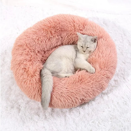 Washable plush donut cat bed for cozy winter sleep, soft calming round pet bed for cats up to 17kg