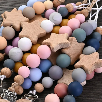 wooden pacifier clip teether with colorful silicone beads and wooden star shapes for baby teething and soother care