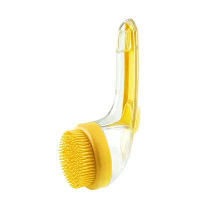 Yellow pet bath brush with shampoo dispenser, soft silicone long handle grooming tool for gentle massage and fur cleaning