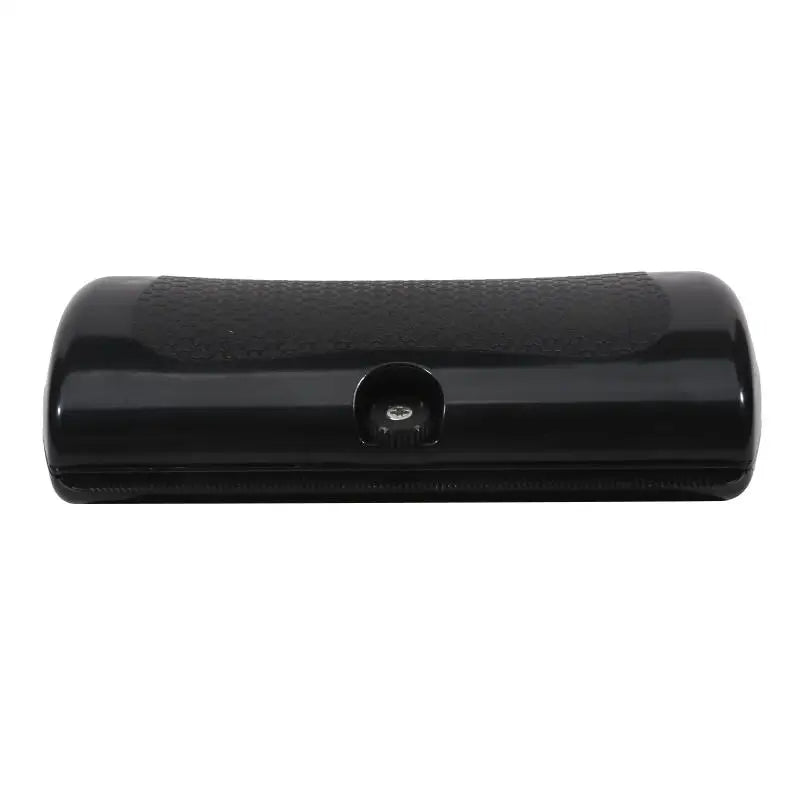 Black pet deshedding brush with ergonomic handle for removing dog and cat hair, multifunctional grooming tool