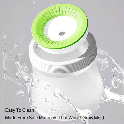 Easy-to-clean dog paw washer cup with green silicone bristles and water splashing