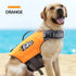 Orange dog life jacket with reflective adjustable straps for dogs swimming in pool, surf, or drifting