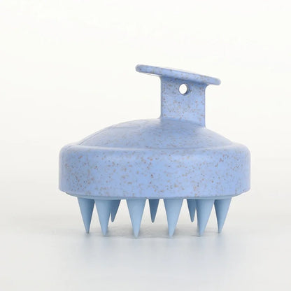 Blue silicone scalp massage brush with soft massage bristles for shampooing, scalp care, and blood circulation