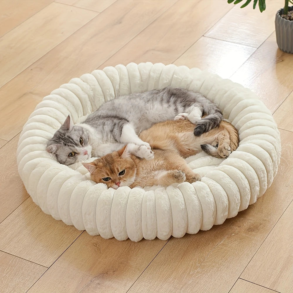 Plush donut cat bed with soft raised bolsters, cozy nesting space for cats and small dogs, ideal for deep sleep and comfort