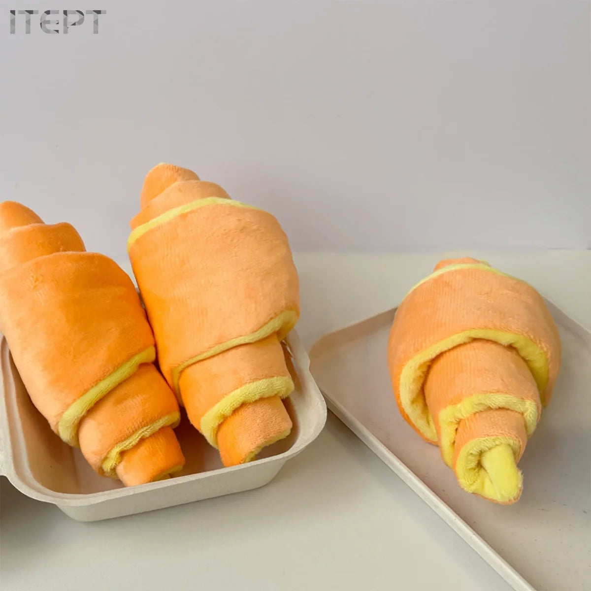 Plush croissant squeaky treat dispensing dog toy for small to medium dogs, durable soft fleece interactive pet plaything