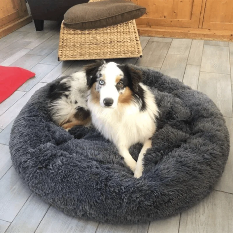 washable donut dog bed for large and medium pets, soft plush calming bed with raised rim for comfort and security
