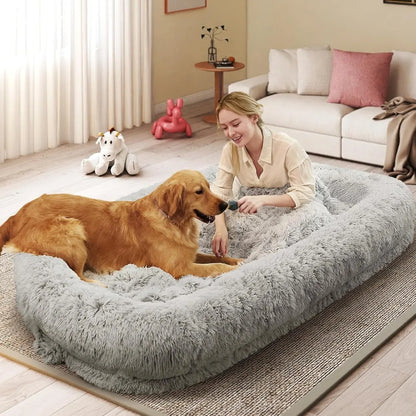 human dog bed for adults, oversized orthopedic plush bed for adults and large dogs in a modern living room