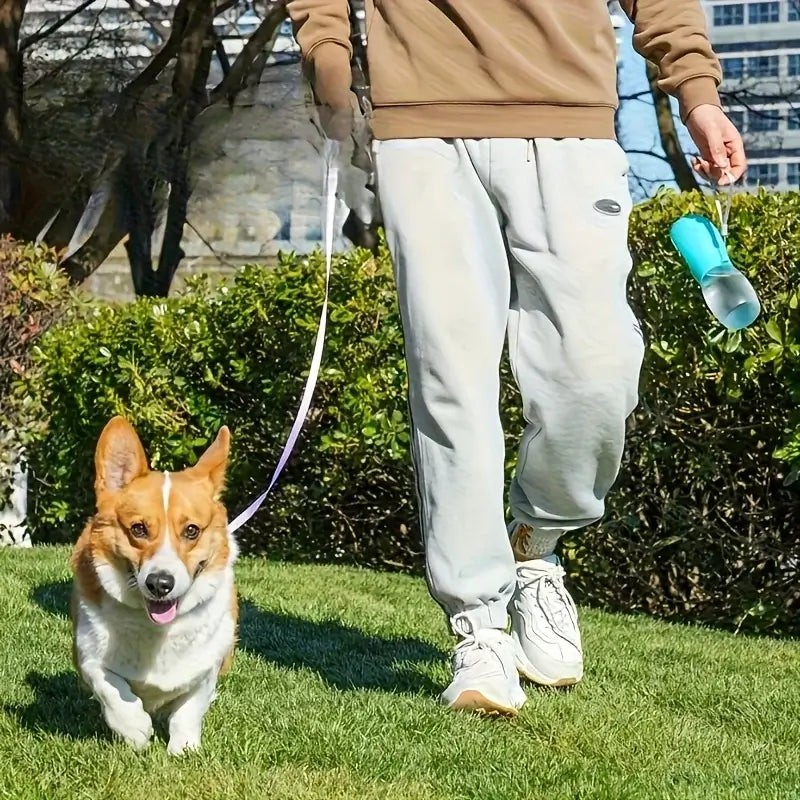 Portable dog water bottle for outdoor walks, pet hydration device, one-handed water container for dogs on the go
