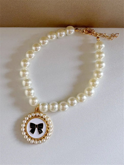 pet pearl necklace collar for dogs and cats, luxury beaded accessory with gold bow charm