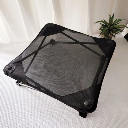 Black waterproof raised mesh dog bed with elevated cooling design for camping, balcony, yard, and garden