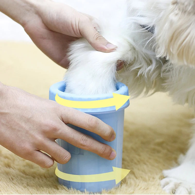 automatic pet paw cleaning cup used to wash a dog paw after outdoor play and reduce dirt tracked indoors
