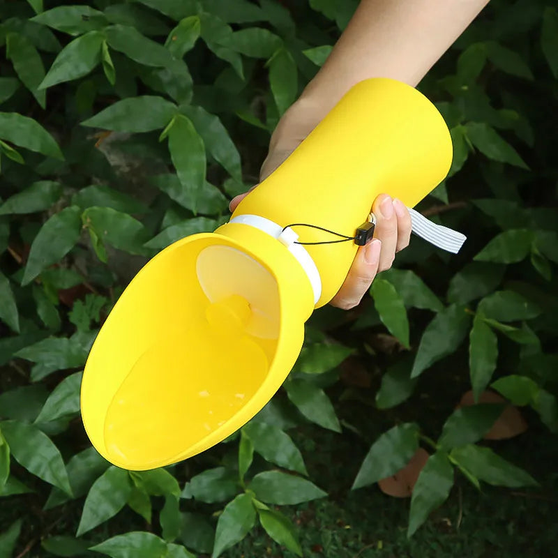 Yellow 550ml collapsible dog water bottle with drinking tray, portable leak-proof plastic pet travel dispenser for outdoor hydration