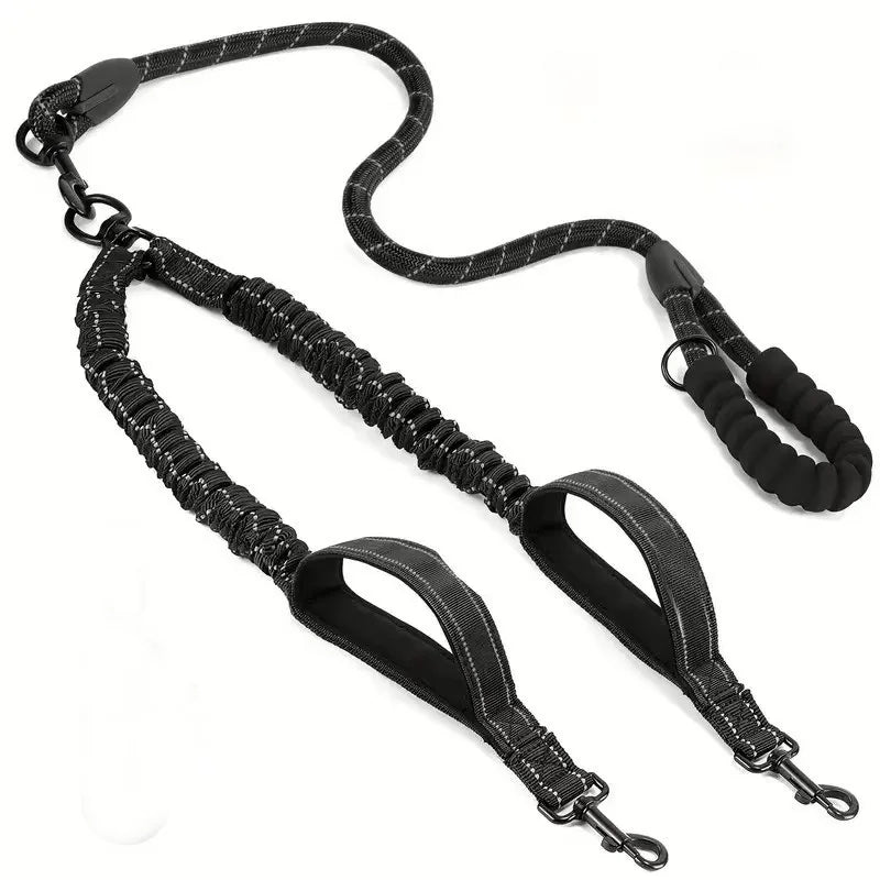 Black double dog leash with padded handle and reflective stitching, designed for walking two dogs.
