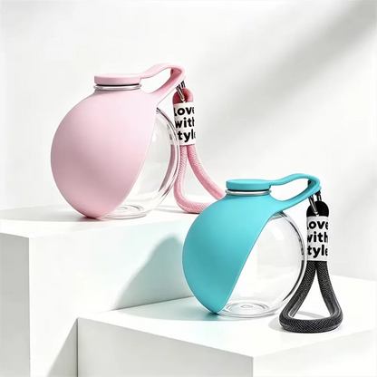 portable pet water bottle with foldable bowl, leak-proof travel dispenser for dogs, pink and blue