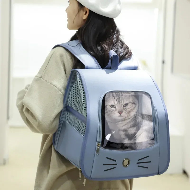Woman wearing a breathable pet carrier backpack with a cat inside, portable cat backpack for outdoor travel
