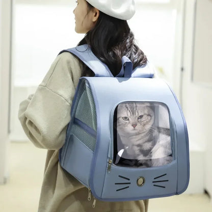 Woman wearing a breathable pet carrier backpack with a cat inside, portable cat backpack for outdoor travel