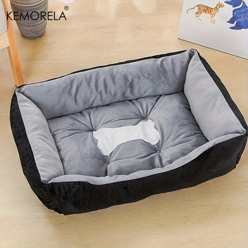 Orthopedic plush dog bed with soft gray cushioning and black sides for small to large dogs, all-season comfort