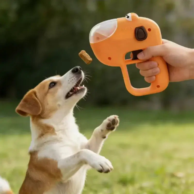 automatic pet treat dispenser for dogs and cats, interactive training reward toy, easy-to-use orange snack launcher