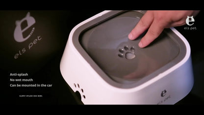 Hand demonstrating anti-splash dog water bowl with paw print design and spill-resistant lid.