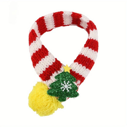 Red and white striped knit dog scarf with yellow pom-pom and green Christmas tree decoration