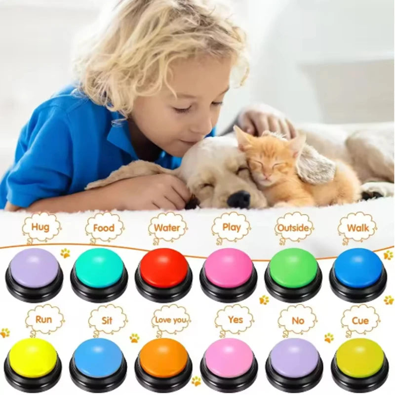 Child with dog and cat beside colorful pet communication buttons labeled with commands