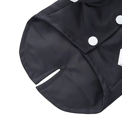 Black dog tuxedo costume with white buttons and open tail design