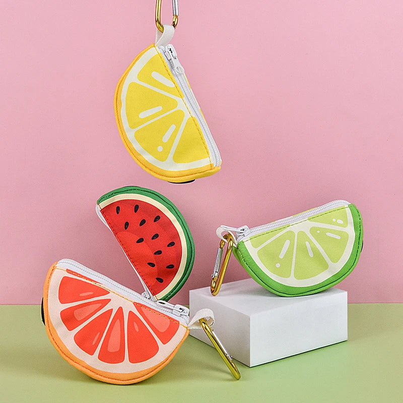 Fruit-shaped dog poop bag holder dispenser for leashes, colorful abstract pet poop bag pouch in lemon, watermelon, orange, and lime designs