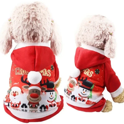 Fluffy dog wearing red Christmas hoodie with festive reindeer and snowman print