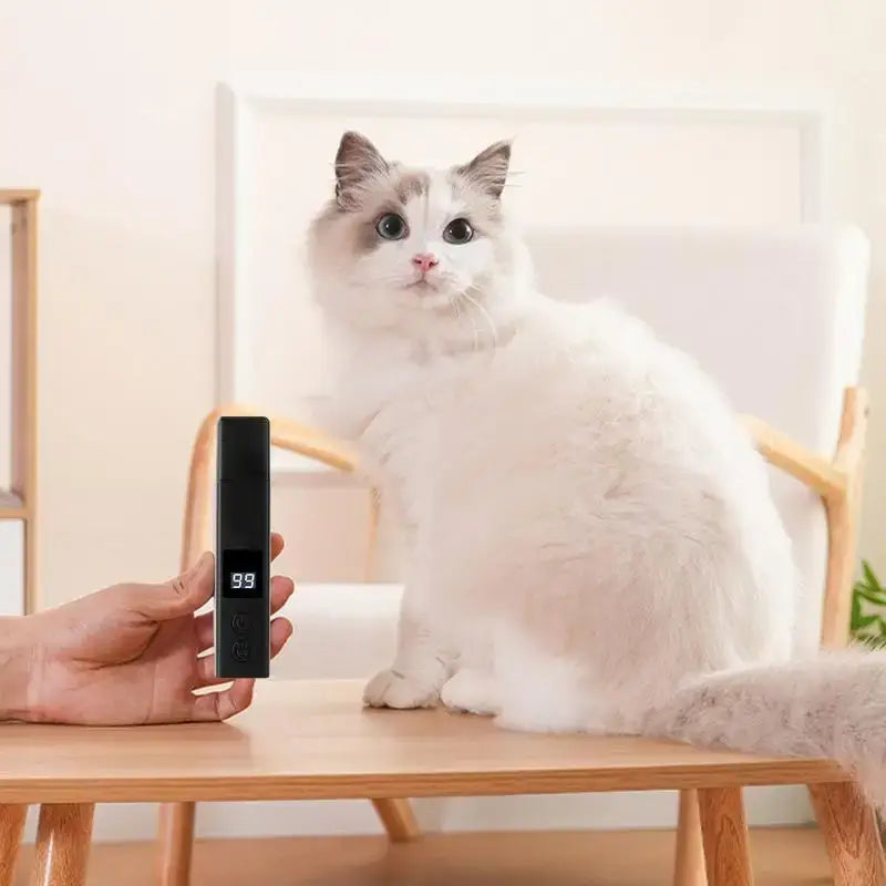 Rechargeable dog nail grinder shown beside a calm cat for quiet, safe pet nail trimming and grooming