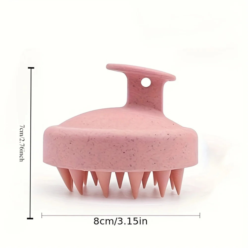 Pink silicone scalp massage brush with soft bristles, 8cm wide and 7cm tall, for shampooing and body massage